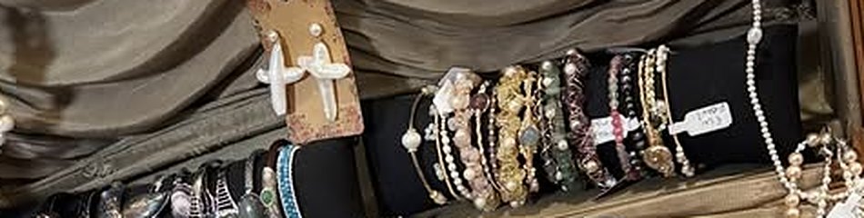 Pearl and stone bracelets on a black velvet roll